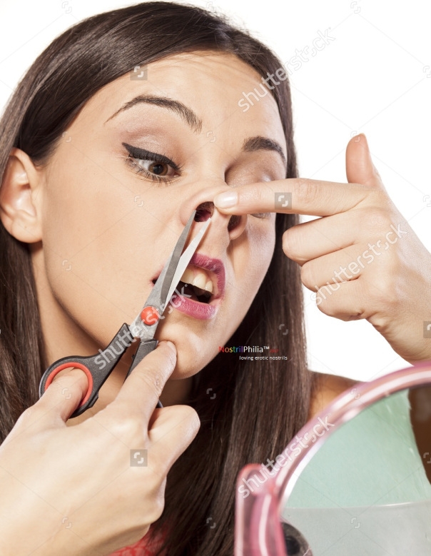 beautiful-girl-cuts-her-nose-hair-with-scissors